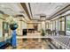 Condo lobby with seating, large windows, and modern decor at 1255 N Gulfstream Ave # 1003, Sarasota, FL 34236