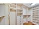 Spacious walk-in closet with ample shelving and hanging space at 1255 N Gulfstream Ave # 1003, Sarasota, FL 34236