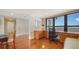 Bright home office with built-in desk and hardwood floors at 1255 N Gulfstream Ave # 1003, Sarasota, FL 34236