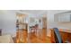Hardwood floors and an open living area with access to kitchen and bedroom at 1255 N Gulfstream Ave # 1003, Sarasota, FL 34236