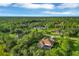 Bird's-eye view of the house, showcasing the property's surroundings at 22408 76Th E Ave, Bradenton, FL 34211