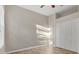 Spacious bedroom featuring wood-look floors and a large closet at 22408 76Th E Ave, Bradenton, FL 34211