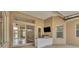 Covered patio with outdoor kitchen and access to the pool area at 22408 76Th E Ave, Bradenton, FL 34211