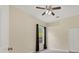 Guest bedroom with ceiling fan and window at 22408 76Th E Ave, Bradenton, FL 34211
