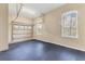 Garage with overhead door, window, and durable flooring at 22408 76Th E Ave, Bradenton, FL 34211