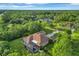 Property overview showing house, pool, and surrounding trees at 22408 76Th E Ave, Bradenton, FL 34211