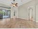 Gathering room featuring tile floors and sliding doors to patio at 22408 76Th E Ave, Bradenton, FL 34211