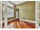 Home office with hardwood floors, large window, and neutral walls at 22408 76Th E Ave, Bradenton, FL 34211