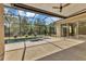 Covered patio overlooking a screened pool and spa at 22408 76Th E Ave, Bradenton, FL 34211