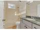Clean bathroom with granite countertop, shower/tub combo, and updated vanity at 22408 76Th E Ave, Bradenton, FL 34211