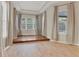 Bedroom with hardwood flooring and a built-in window seat at 22408 76Th E Ave, Bradenton, FL 34211
