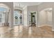 Bright and airy entryway with tile floors and double doors at 22408 76Th E Ave, Bradenton, FL 34211