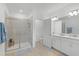 Modern bathroom with double vanity and a walk-in shower at 4119 Via Sienna Cir, Sarasota, FL 34243