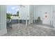 Outdoor kitchen and patio area by the pool at 4119 Via Sienna Cir, Sarasota, FL 34243