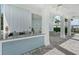 Relaxing pool area with covered patio and bar at 4119 Via Sienna Cir, Sarasota, FL 34243