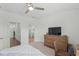 Spacious bedroom with wood-look floors and a large dresser at 4119 Via Sienna Cir, Sarasota, FL 34243