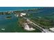 Breathtaking aerial shot showcasing the waterfront property and its proximity to serene waterways and lush mangroves at 236 Hidden Bay Dr # 301, Osprey, FL 34229