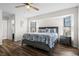 Main bedroom with wood flooring and access to the pool at 10194 Thames Ave, Englewood, FL 34224