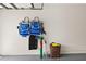 Garage with storage for beach chairs, surfboard, and other items at 10194 Thames Ave, Englewood, FL 34224