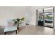 Living area with sliding glass doors leading to pool and patio at 10194 Thames Ave, Englewood, FL 34224