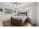 Guest bedroom with wood flooring and large windows at 10194 Thames Ave, Englewood, FL 34224