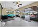 Enclosed patio with comfortable seating and pool access at 10194 Thames Ave, Englewood, FL 34224
