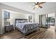 Main bedroom with private access to the pool area at 10194 Thames Ave, Englewood, FL 34224