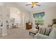 Relaxing sitting area with large window and view at 11358 Lomita Wren Rd, Weeki Wachee, FL 34614