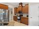 Updated kitchen boasts stainless steel appliances and wood cabinetry at 11358 Lomita Wren Rd, Weeki Wachee, FL 34614