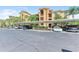Condo building exterior with covered parking at 6519 Grand Estuary Trl # 205, Bradenton, FL 34212