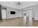 Open living space with high ceilings and modern lighting at 9004 Artisan Way, Sarasota, FL 34240