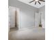 Spacious bedroom with neutral walls, carpeting, and access to bathroom at 9004 Artisan Way, Sarasota, FL 34240