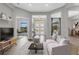Bright and airy living area with stylish furnishings at 9004 Artisan Way, Sarasota, FL 34240