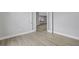 Bright office with hardwood floors and view to kitchen at 9004 Artisan Way, Sarasota, FL 34240