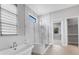 Spa-like bathroom with a large soaking tub and a walk-in shower at 9004 Artisan Way, Sarasota, FL 34240