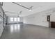 Large garage with epoxy floor and ample storage at 9004 Artisan Way, Sarasota, FL 34240