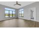 Bright Gathering room with water views and wood-look flooring at 9004 Artisan Way, Sarasota, FL 34240