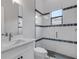 Clean bathroom with white vanity, glass shower, and modern tile at 9004 Artisan Way, Sarasota, FL 34240
