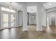 Elegant foyer with high ceilings and hardwood floors at 9004 Artisan Way, Sarasota, FL 34240