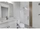 Modern bathroom with white vanity and glass shower at 9004 Artisan Way, Sarasota, FL 34240