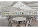 Large event space features high ceilings, abundant natural light, and ample seating for various occasions at 14480 Eagle Branch Dr, Nokomis, FL 34275