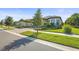 Desirable one-story home with paver driveway, two-car garage, and attractive landscaping at 14480 Eagle Branch Dr, Nokomis, FL 34275