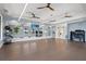 Well-lit gym with mirrored walls and a variety of equipment for diverse fitness activities at 14480 Eagle Branch Dr, Nokomis, FL 34275