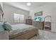 Main bedroom featuring a serene atmosphere, light colored walls, and natural light at 14480 Eagle Branch Dr, Nokomis, FL 34275