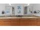 Bathroom vanity with double sinks, granite countertop, and decorative mirrors at 3007 Avenue F # 1, Holmes Beach, FL 34217