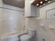 Functional bathroom featuring a standard tub, toilet, and vanity cabinet at 3007 Avenue F # 1, Holmes Beach, FL 34217