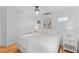 Bright bedroom with a king-size bed, beach-themed decor, and natural light at 3007 Avenue F # 1, Holmes Beach, FL 34217