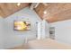Comfortable bedroom with TV and wood ceiling at 3007 Avenue F # 1, Holmes Beach, FL 34217