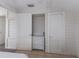 Bright room with a built-in closet and white wicker drawers at 3007 Avenue F # 1, Holmes Beach, FL 34217