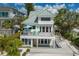 Beautiful home with a spacious deck, ideal for outdoor gatherings and enjoying the surrounding coastal views at 3007 Avenue F # 1, Holmes Beach, FL 34217